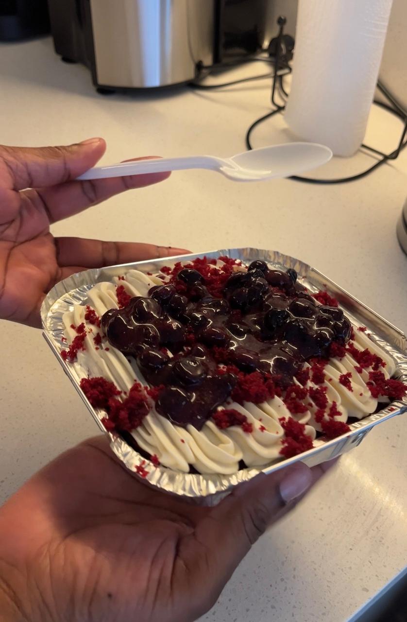 A red velvet and blueberry dessert made from the course